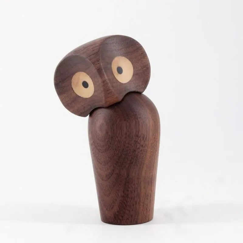 This Handmade Wooden Owl, crafted from teak wood, features a rotatable head and intricate design. A charming, interactive decor piece perfect for nature lovers and gifts.