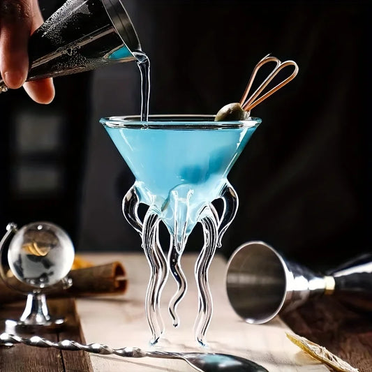 Serve cocktails with flair using the 120ml Octopus Cocktail Glass. Its unique design mimics octopus or jellyfish, adding whimsy and elegance to any drink.