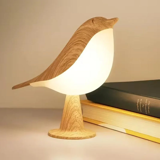 Charming flower and bird design with touch-activated three-color dimming. Dual function as desk lamp and aromatherapy diffuser. Compact, durable ABS, LED light source, and boxed for secure delivery