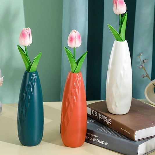 Versatile and unbreakable, our Plastic Vases elevate any decor with endless creativity. Perfect for home, office, or weddings.