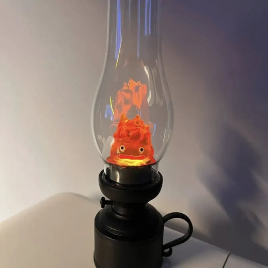 Illuminate your space with the Retro Anime Calcifer Flameless Night Light. Inspired by anime, this flickering fire ember adds a whimsical touch to any room.