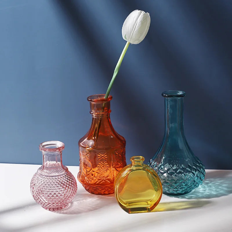 Elevate your decor with our Vintage Nordic Glass Vases, crafted with Art Deco elegance. Perfect as dining table centerpieces or office desk accents.