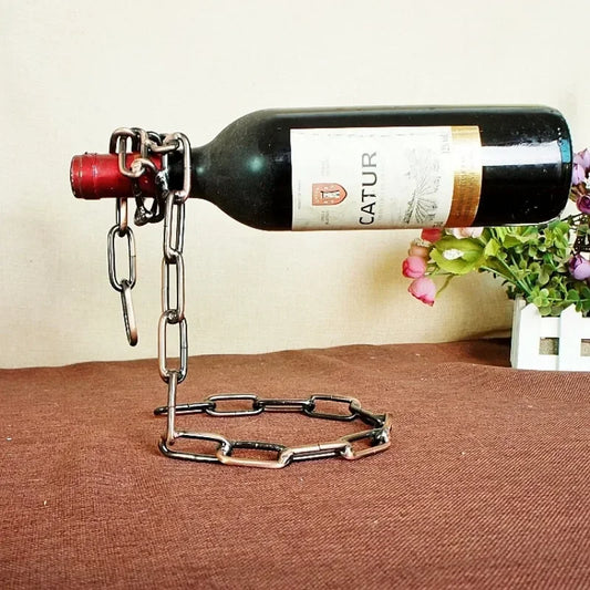 Enhance your wine presentation with the Creative Floating 3D Chain Wine Stand. Sleek Nordic design and vintage finish for a mesmerizing tabletop display.