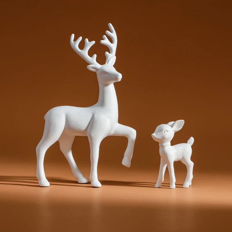 Add charm to your child's room or holiday decor with these adorable Mother Deer and Fawn Figurines. Crafted for durability, they bring whimsy and warmth to any space.