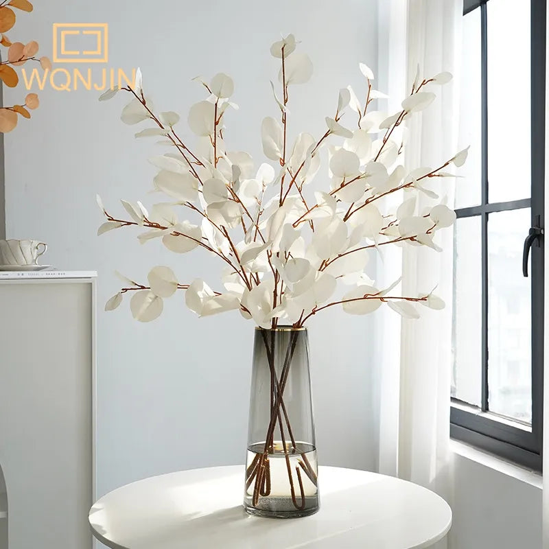 Enhance your decor with Simulated Eucalyptus Apple Leaf Green Plant. Perfect for weddings, events, or home decor. Easy to maintain and reshape for lasting beauty.