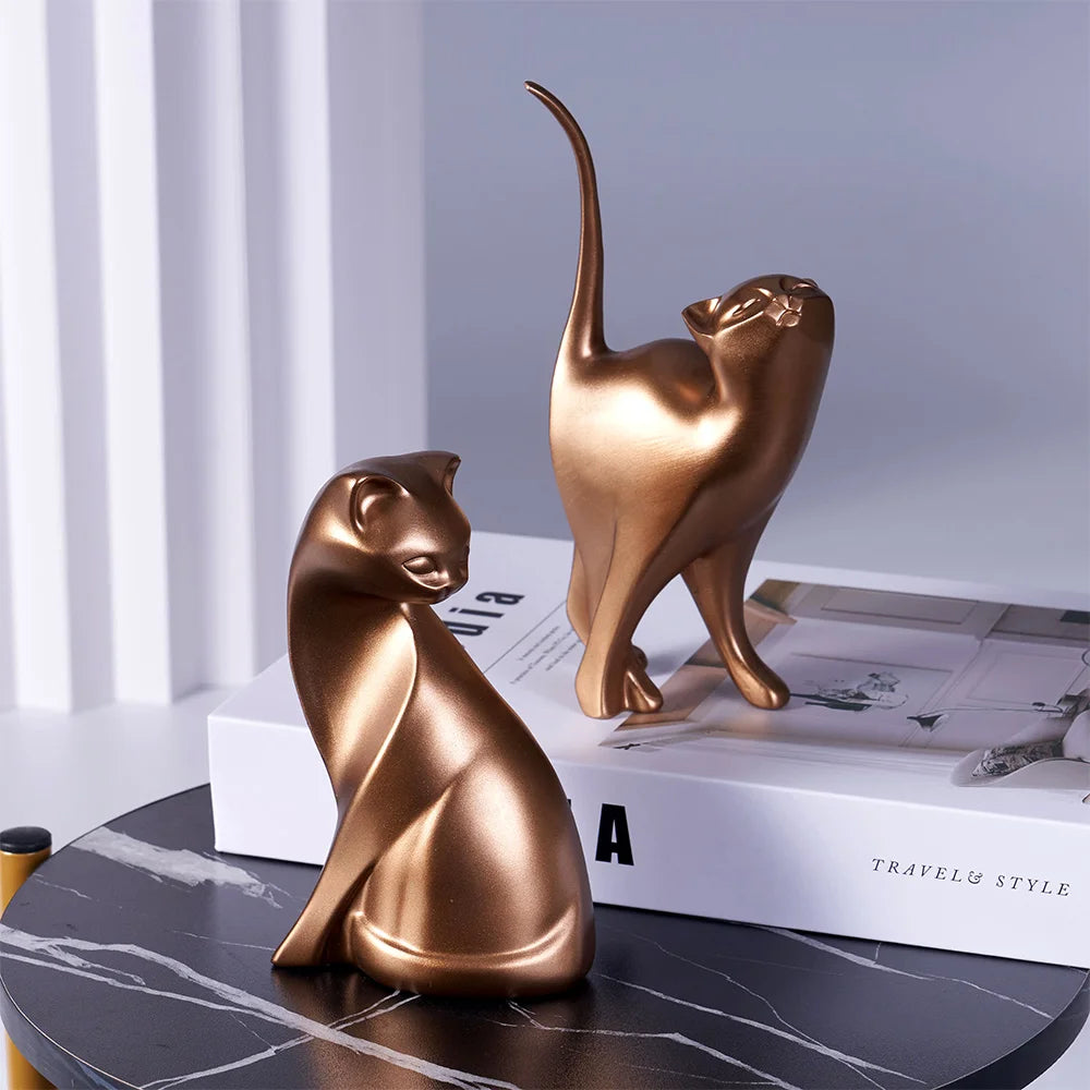 Celebrate love with the Golden Couples Cat Figurine. Crafted from high-quality resin and finished in gold, this elegant sculpture symbolizes unity and adds luxury to any décor.