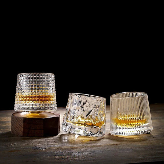 Elevate your whiskey experience with the Novelty Rotatable Old Fashioned Glass. Intricate crystal patterns and a wooden coaster enhance sophistication and flavor.