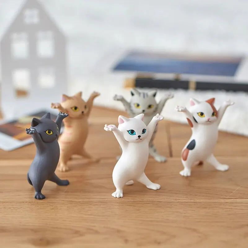 Discover whimsical charm with the 5 Models Dancing Cat Figure Decorations. These animated cat models bring playful grace to any space as delightful ornaments or gifts.