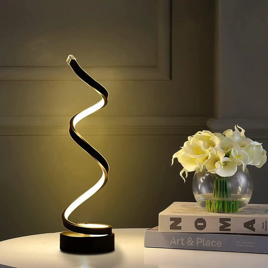 Elevate your space with the 3-Way Dimming Modern Spiral Table Lamp. Featuring 3 LED colors, 10 brightness levels, and energy efficiency for stylish, customizable lighting.