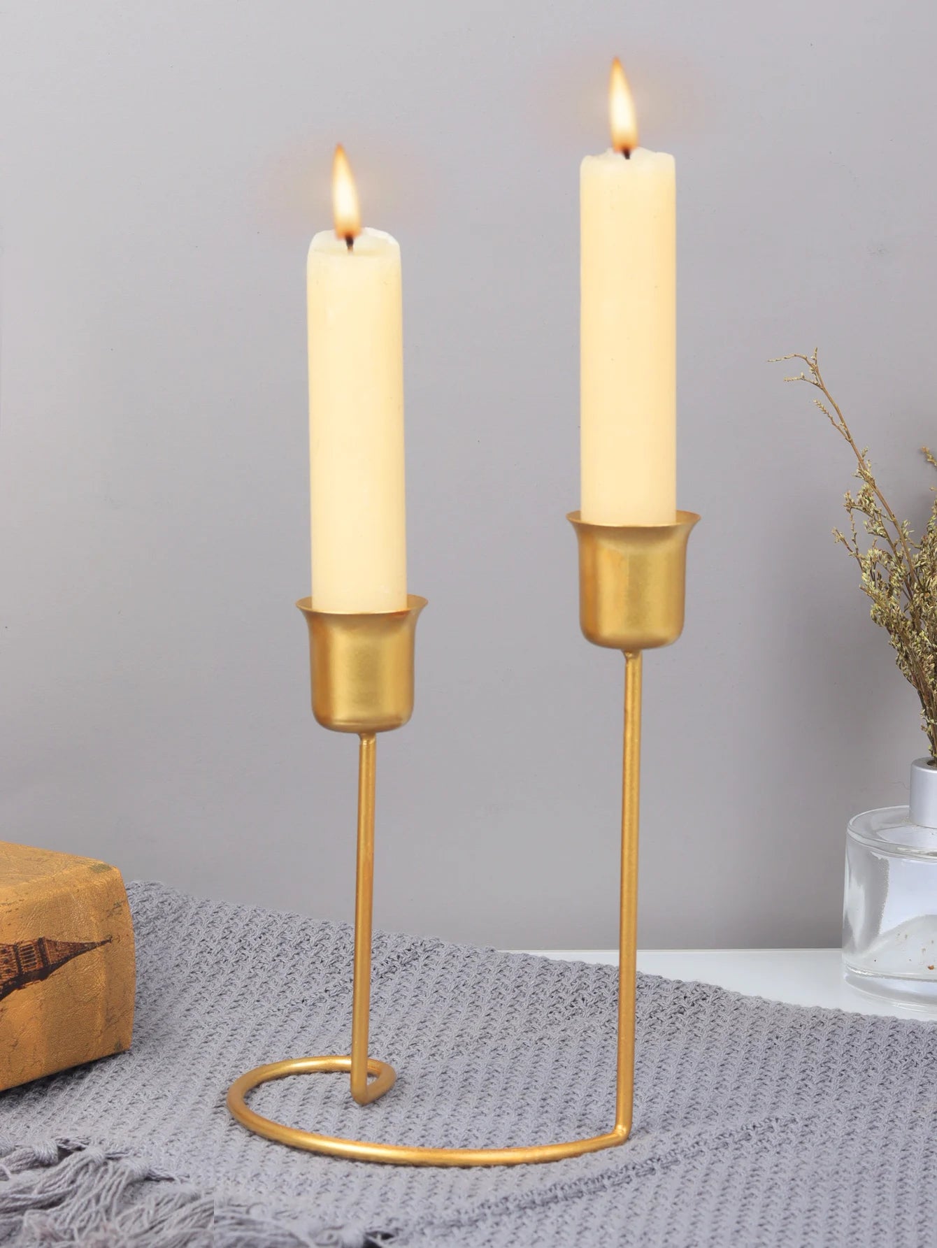 Create a romantic ambiance with our Nordic Iron Art Candlestick. Ideal for dinners and weddings, its sleek design adds elegance and warmth to any occasion.