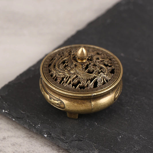 Discover the Antique Brass Pocket Dragon Phoenix Incense Burner, intricately designed with dragon and phoenix motifs for mystical elegance and aromatic enhancement.