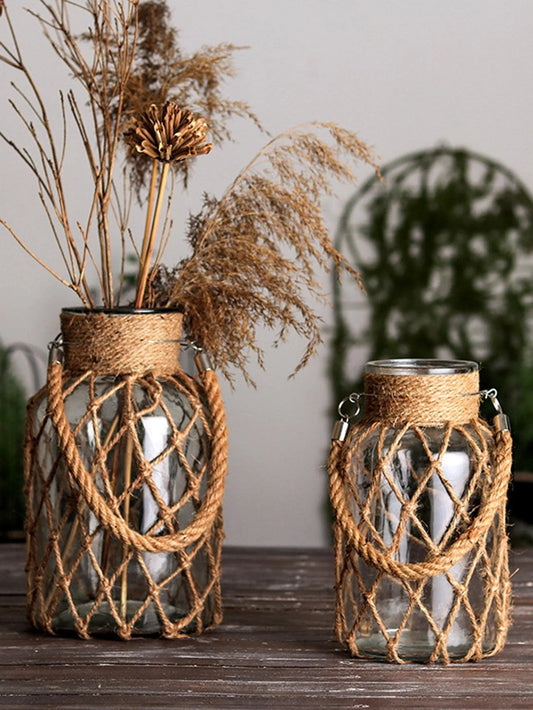 Explore charming glass vases with hemp rope accents, ideal for farmhouse-style decor and versatile enough for weddings or home settings.