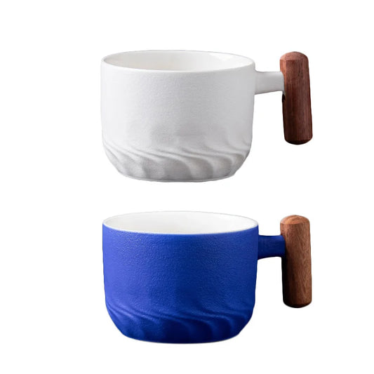 Enjoy beverages in this handcrafted ceramic mug with a rustic wooden handle. Unique design, microwave safe, perfect for gifts and special occasions.