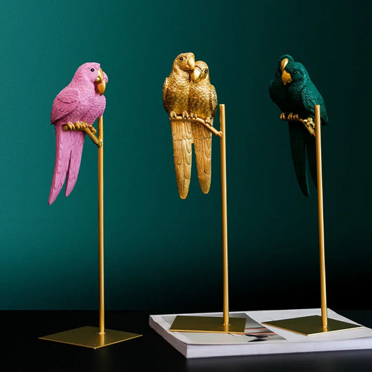 Elegant resin parrot statues on a golden stand, available in Pink, Gold, Green. Adds luxury to any room. Great gift, photo prop, or home decor piece