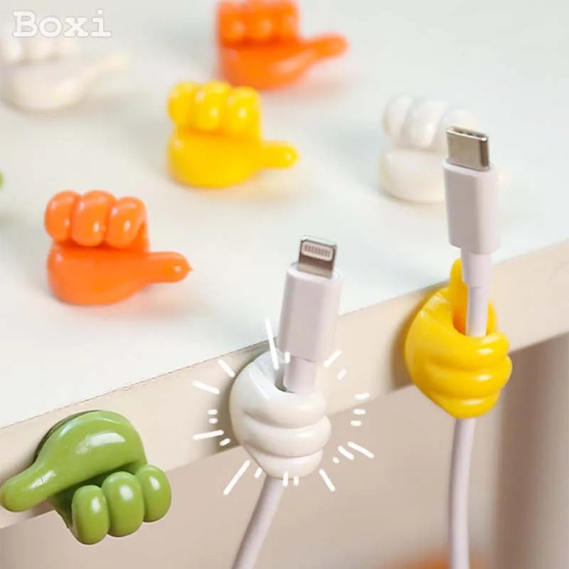 Keep your cables organized and tangle-free with Silicone Thumb Wall Hooks. Easy to install, these fun clips secure wires on any smooth surface.