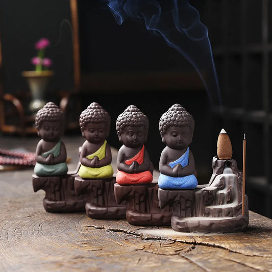 Discover tranquility with our Ceramic Monk Incense Burner. This elegant piece accommodates both sticks and cones, adding spiritual charm to any space.