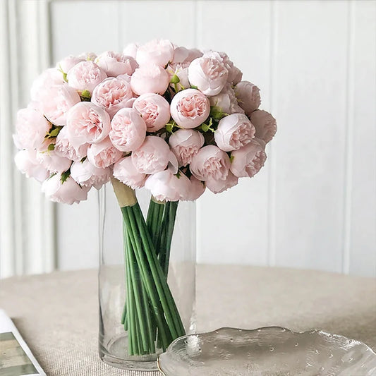 Elevate your special occasions with this lifelike Artificial Peony Rose Bouquet. Featuring 27 vibrant, eco-friendly peony rose heads, it's perfect for weddings and celebrations without the upkeep.