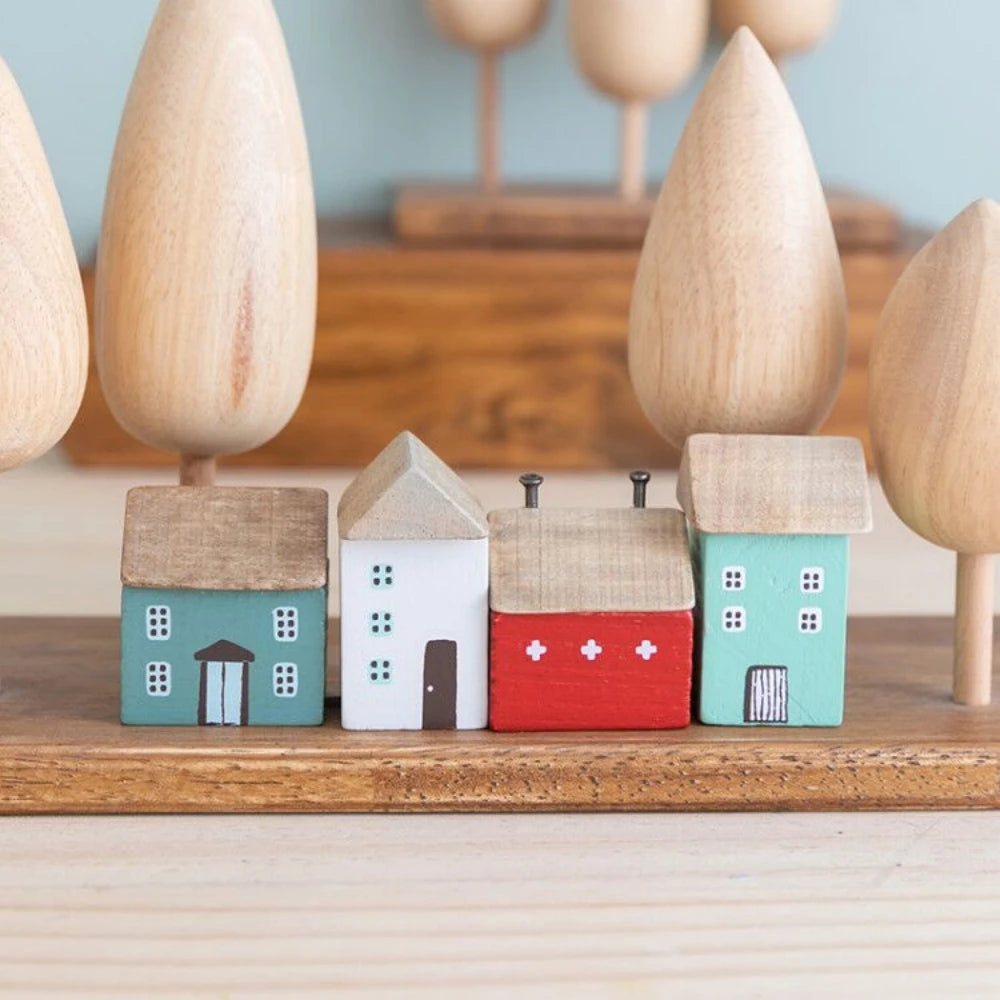 Charming miniature wooden house with a fairytale design. Handmade with an aged finish for a rustic look. Unique, durable decor with a magical touch."