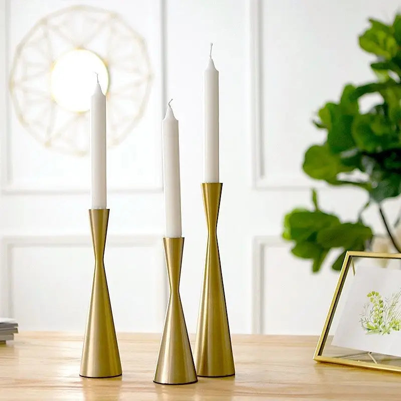 Add elegance to your home with these Vintage Golden Candle Holders. Made from durable metal alloy, available in three sizes, perfect for any occasion or gift.