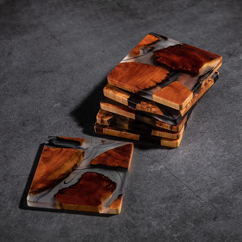 Elegant resin coasters: made from Thuja wood chips, resin, and Chinese ink splashing. Durable, fragrant, and heat-insulating with a unique, ancient-inspired design.