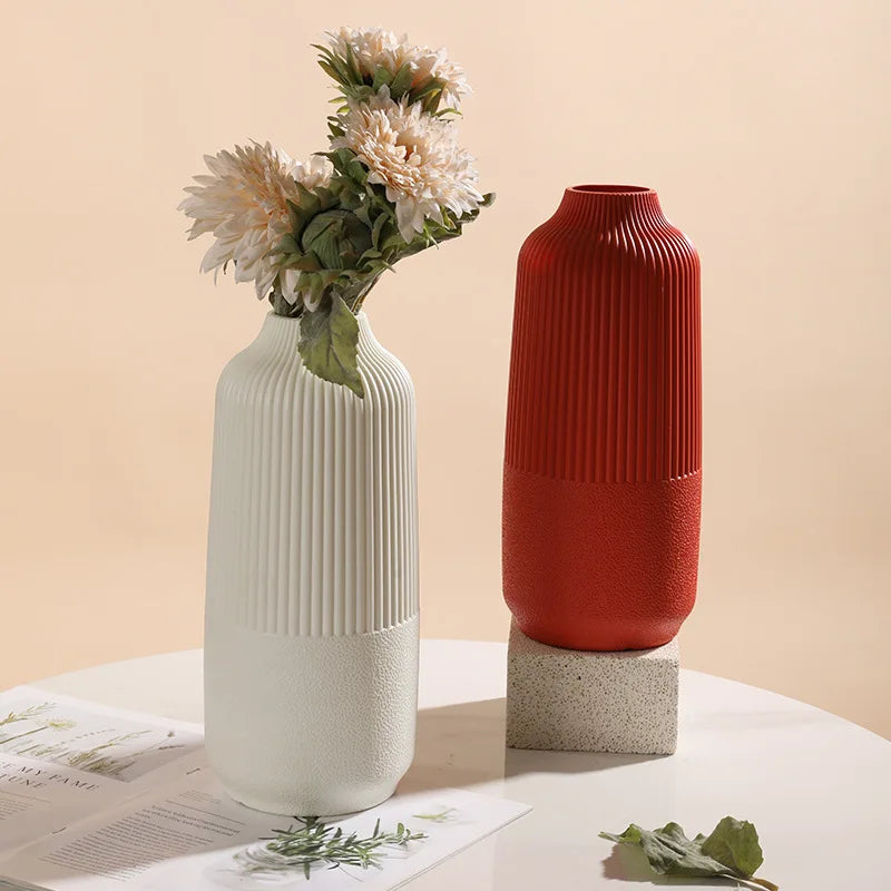 Upgrade your decor with our Modern Large Nordic Flower Vase. Durable plastic, stylish design, and available in three chic colors. Perfect for any space.