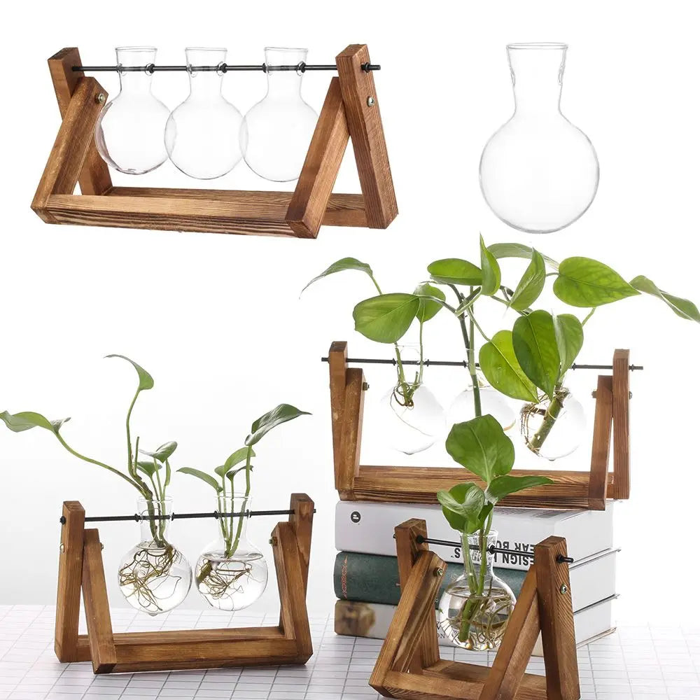 Add rustic charm to your decor with our vintage-style Hydroponic Plant Vases Glass Vase. Features a clear glass vase in a sturdy wooden frame for elegant plant display.