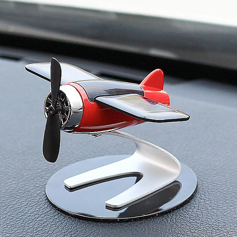 Elevate your car's interior with our Creative Solar Panel Airplane Car Decoration. This charming accessory features solar-powered propellers and a dynamic design, perfect for car enthusiasts.