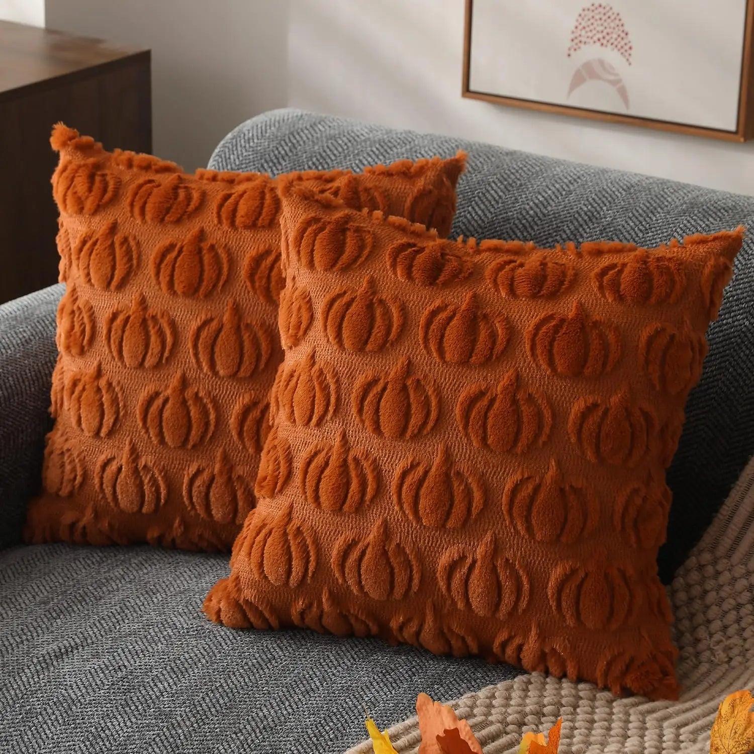 Add a cozy touch to your decor with these Pumpkin Patterned Pillow Covers. Crafted from durable fabric, they are machine washable and perfect for autumn!