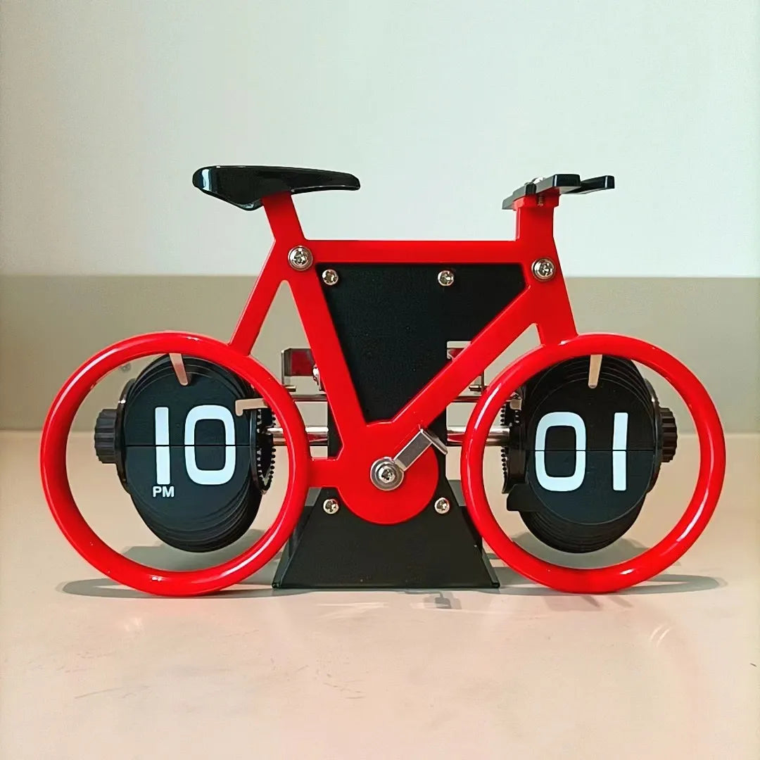 Enhance your decor with our Creative Bicycle Flip Clock, a vintage-inspired timepiece that combines retro charm and modern functionality for any space.