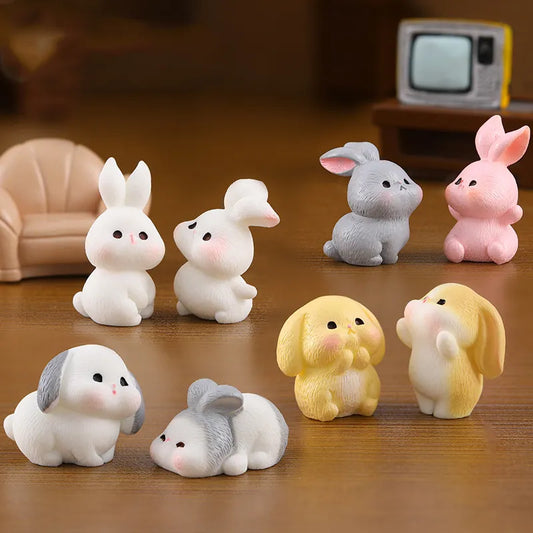 Brighten your space with this cute Miniature Rabbit Figurine. Crafted from resin, it's perfect for desks, bookshelves, or garden scenes. A delightful gift!