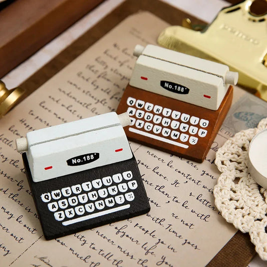 Elevate your desk with our Vintage Typewriter Shape Card Holder. Crafted from premium wood, this stylish and functional holder adds nostalgic charm to your workspace.