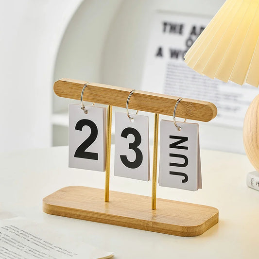 Elevate your desk with this Minimalist Style Wooden Calendar Ornament. Crafted from high-quality wood, it combines functionality with modern elegance, perfect for any workspace.