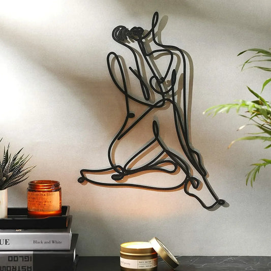 Elevate your space with this minimalist female body wire art decor, crafted from durable metal wire. Ideal for indoor or outdoor display, it adds elegance and artistic flair to any room. 